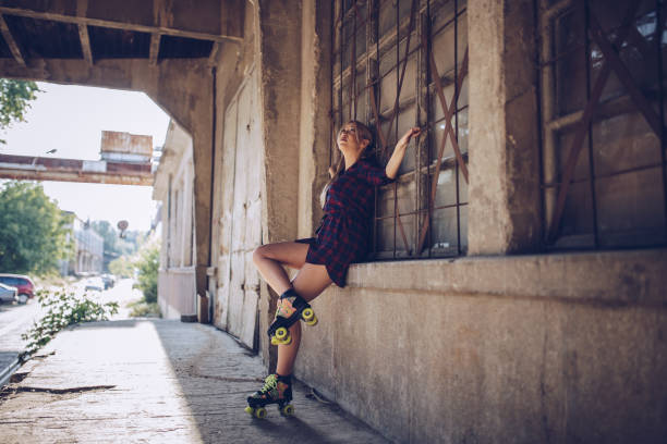 istock Beautiful woman on roller skates 1141176573