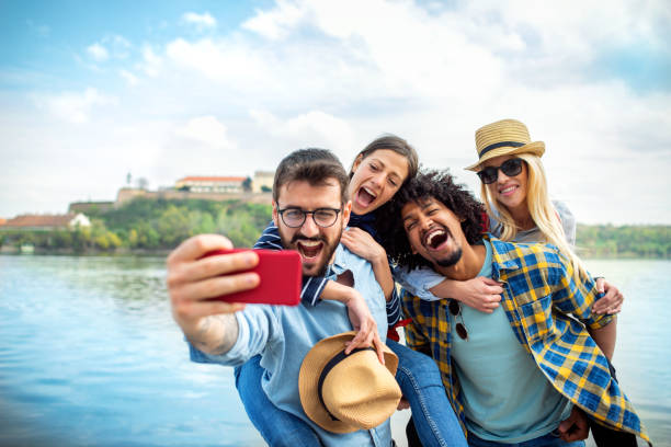 istock Group of friends making selfie 1141176765