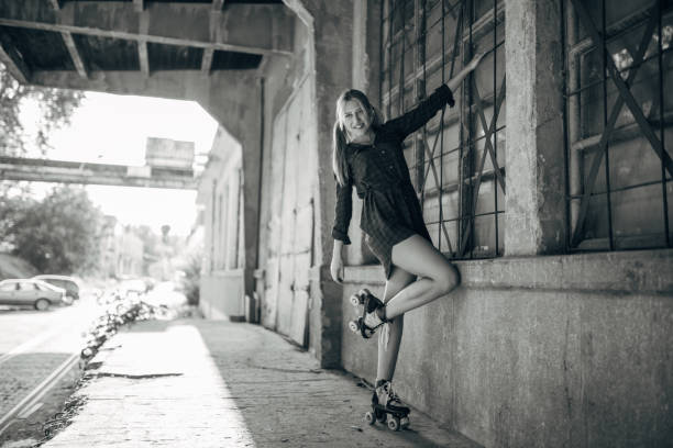 istock Young woman on roller skates 1141177545