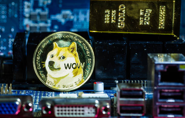 Front view of Dogecoin cryptocurrency physical coin stock photo