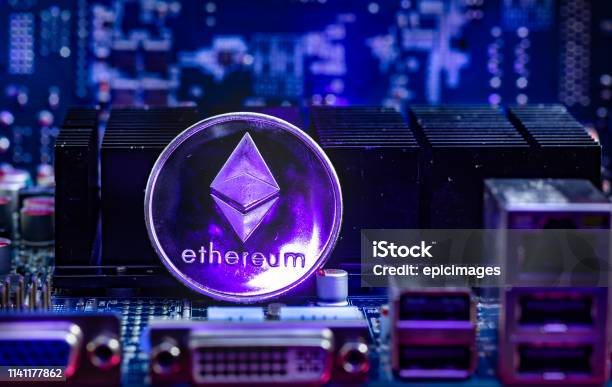 Front View Of Ethereum Cryptocurrency Physical Coin Stock Photo - Download Image Now