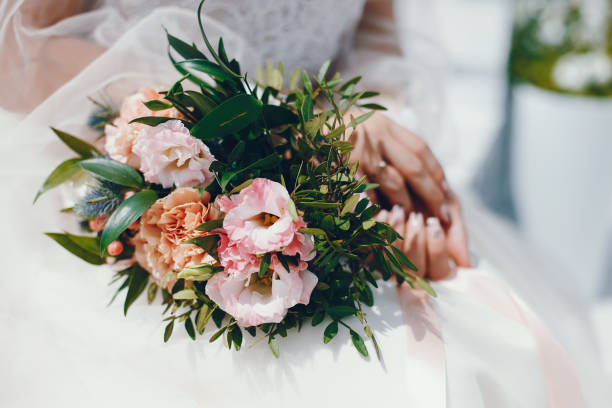 istock Beautiful bride in a long white wedding dress 1141178193
