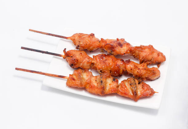 istock Chicken butt grilled on white plate 1141178380