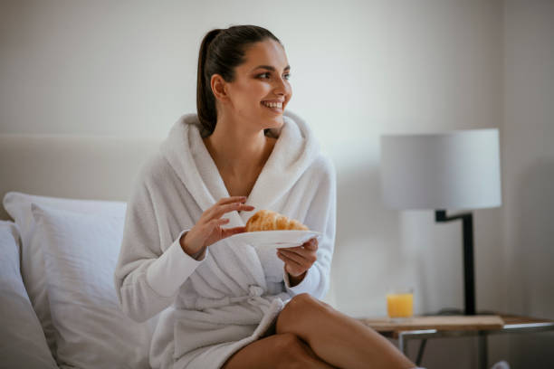 istock Young women having croissant 1141180544