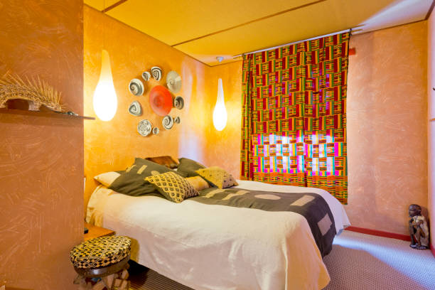 istock Bedroom decorated in warm bright colors 1141180994
