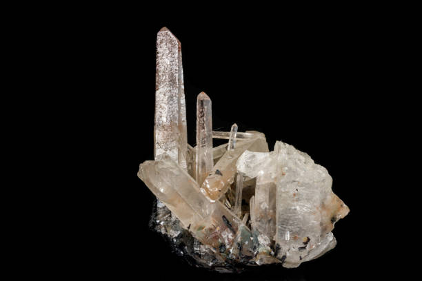 Quartz Crystals formation against a black background. High detailed with prismatic light.