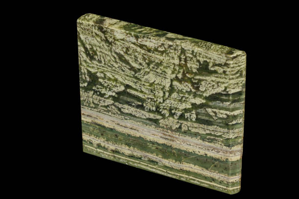 istock Macro datolite scarn mineral stone on a black background 1141182401
