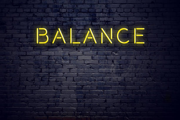 istock Night view of neon sign with text balance 1141182609
