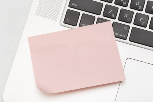 istock Sticky note on laptop with copy space. For all concept - Image 1141183369