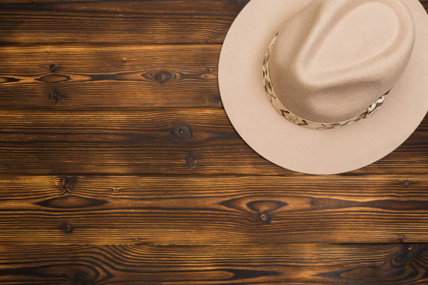 istock Felt hat on wooden background- Image 1141183424