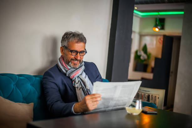 istock Senior man reading the newspaper 1141183492
