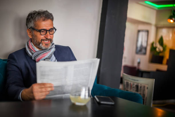 istock Senior man reading the newspaper 1141183504