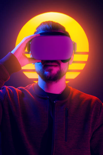 istock VR head set videogame in 80's synthwave and retrowave futuristic vaporwave aesthetics. 1141184144