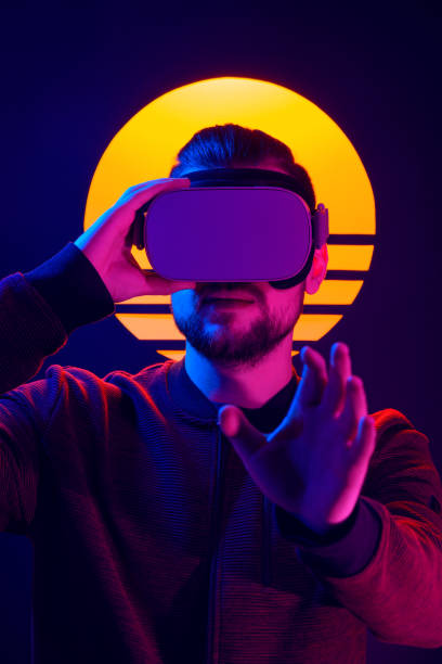 istock VR videogame experience in 80's synthwave aesthetics. 1141184460