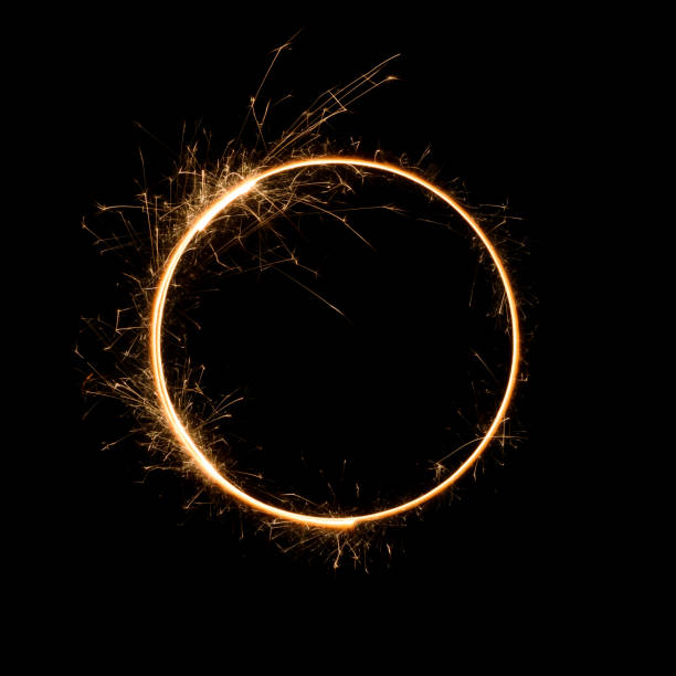 Burning bengal fire round letter o number zero Sparkler circle shape. Burning bengal fire round letter o number zero, long exposure. flaming o symbol stock pictures, royalty-free photos & images
