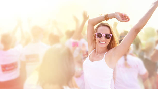 istock Ecstatic woman loving the concert 1141185741