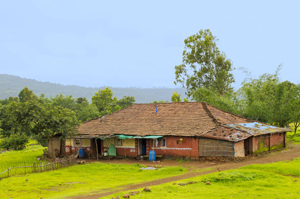 Indian traditional village house in Konkan region near Varandhaghat, Pune, Maharashtra Indian traditional village house in Konkan region near Varandhaghat, Pune, Maharashtra village maharashtra stock pictures, royalty-free photos & images