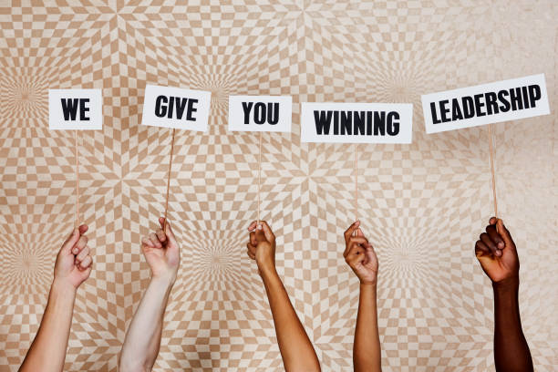 istock Raised hands hold signs 