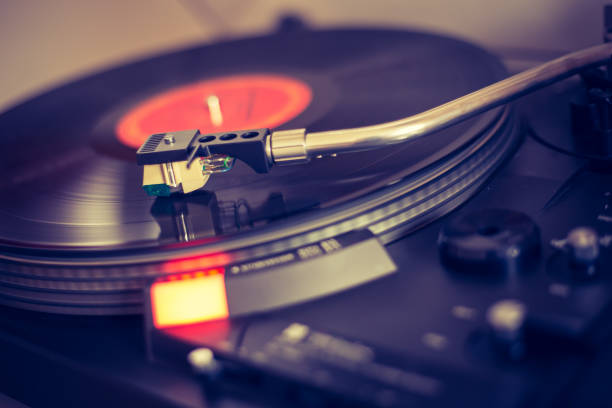 istock Playing retro music: Professional turnable audio vinyl record music player 1141188533
