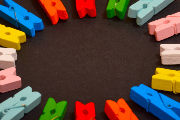 istock Close-up circle of colorful clothespins 1141189253