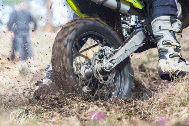 istock motorcycle, throwing the country back wheel 1141189875