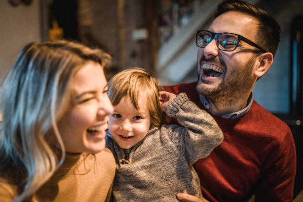 istock Cheerful family having fun together at home. 1141190261