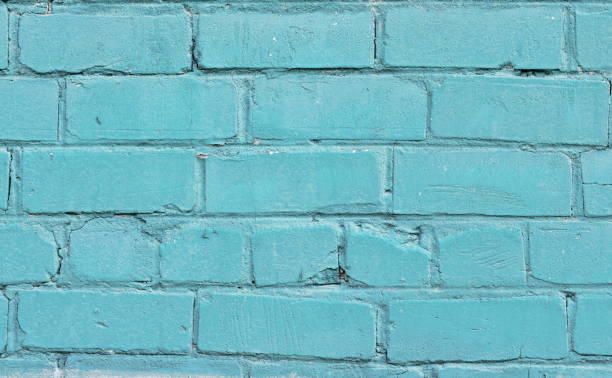 istock Texture of old blue brick wall surface with cement seams 1141190465