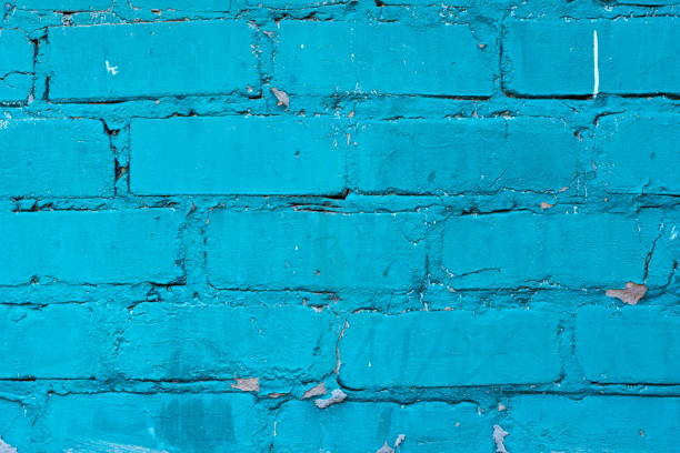 istock Texture of old blue brick wall surface with cement seams 1141190466