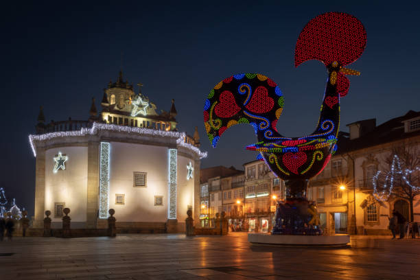 BARCELOS, PORTUGAL - CIRCA JAUARY 2019: View at the Pop Galo at night, public art inspired in the Barcelos cock, cosidered one of the most important symbols of Portuguese popular culture.