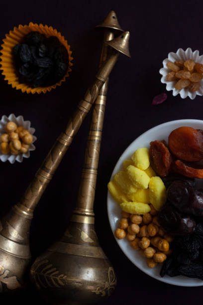 istock Eid Mubarak. Different iftar sweets. Celebrating Eid Al Adha. Islamic traditional holiday. Eid al-Fitr. Holly month Ramadan. Middle Eastern religious holiday. Dried date fruit. Flat lay, top view. 1141192964