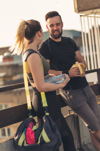 istock Couple relaxing after a workout 1141193903