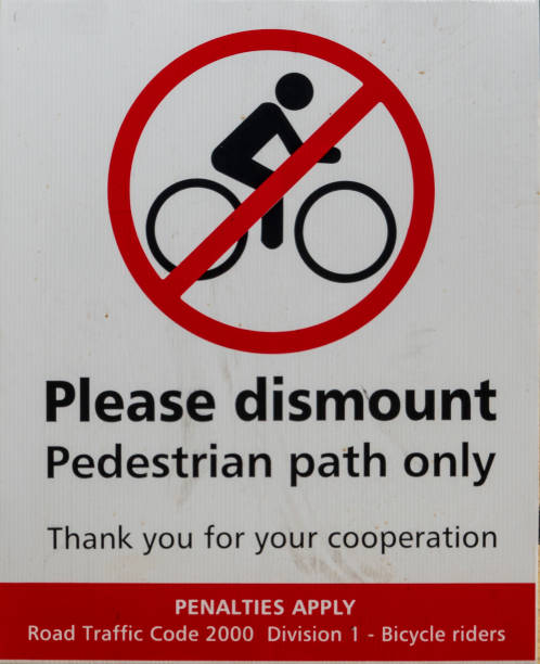 istock Warning sign in park in Perth Australia telling bicyklists to dismount. 1141194515