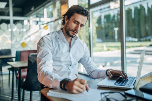 istock Businessman working in cafe 1141196214