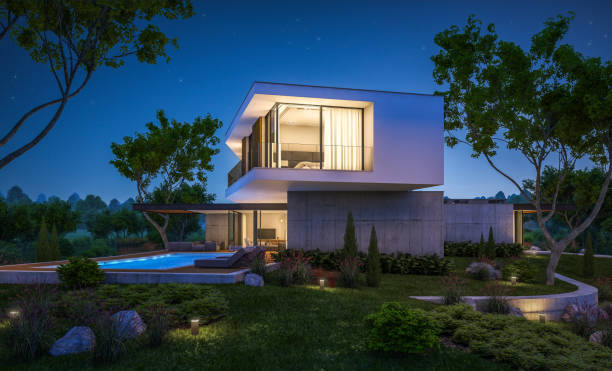 istock 3d rendering of modern house on the hill with pool in night 1141196285