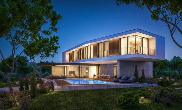 istock 3d rendering of modern house on the hill with pool in night 1141196292