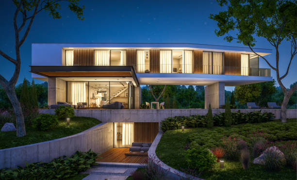 istock 3d rendering of modern house on the hill with pool in night 1141196306