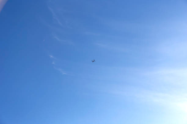 istock White quadcopter drone with photo camera 1141199119