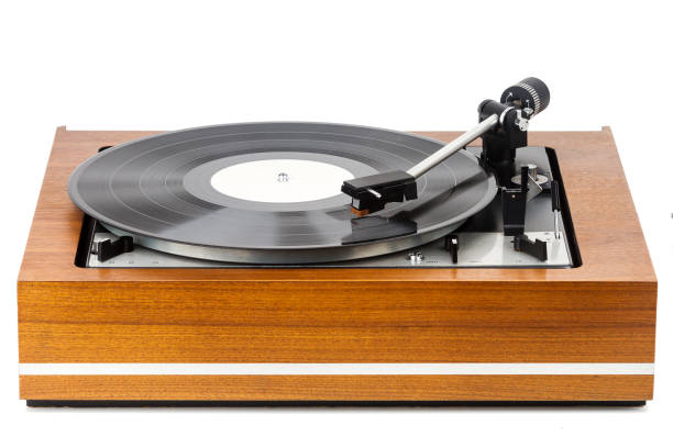 istock Vintage turntable vinyl record player isolated on white 1141199566