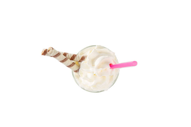 istock Milkshake with waffle, straw isolated white view up 1141199901
