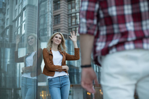 istock Happy smiling lady waiting for her boyfriend 1141201479