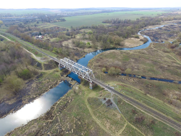 istock Railway bridge over the river, view from above 1141203392