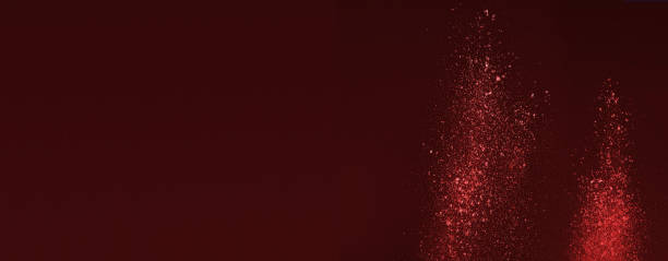 istock image of splashes on a red background 1141204634