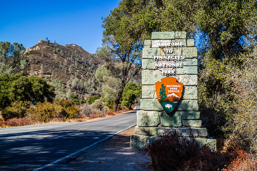Pinnacles National Park, California, USA - November 4, 2017: A welcoming signboard at the entry point of preserve park