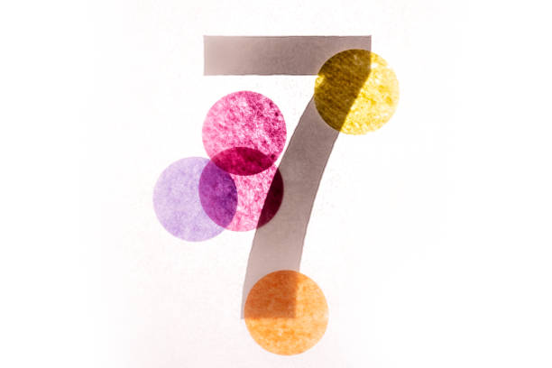 istock 7 number seven, graphic black digit and creative typography with colourful wheels, happy birthday 1141205105