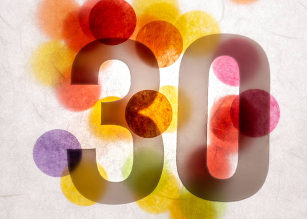 istock 30 number thirty, graphic black digit and creative typography with many colourful wheels, happy birthday 1141205162