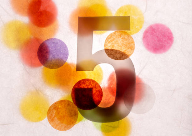 istock 5 number five, graphic black digit and creative typography with many colourful wheels, happy birthday 1141205192