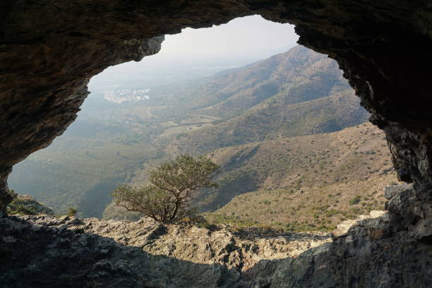 istock View of a valley from inside cave Catalonia Spain 1141205218