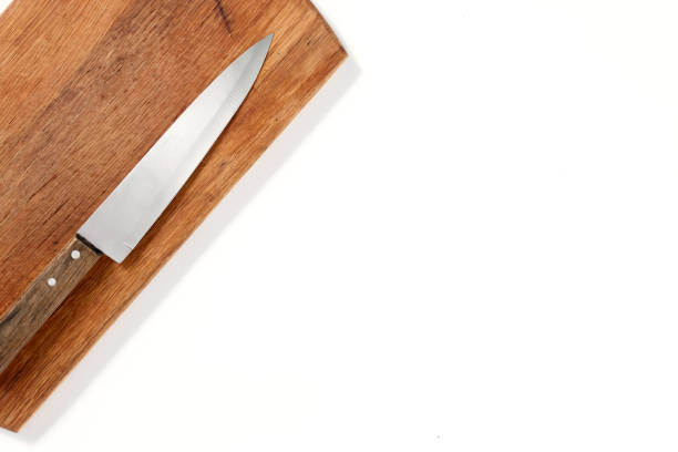 istock Design concept of mockup cutting board and knife set isolated on white background. Copyspace for text and logo. Clipping Path included on white background. 1141205382