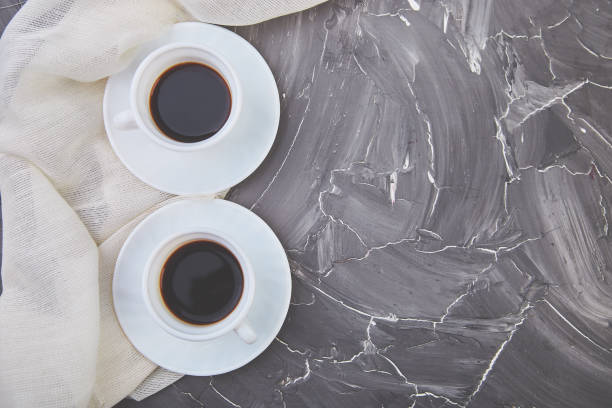 istock Two white cups of espresso on grey grunge background. 1141205532