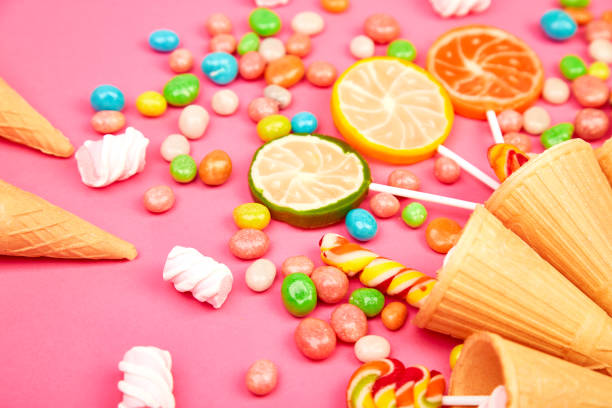istock Ice cream waffles cones with colorful candy 1141205544